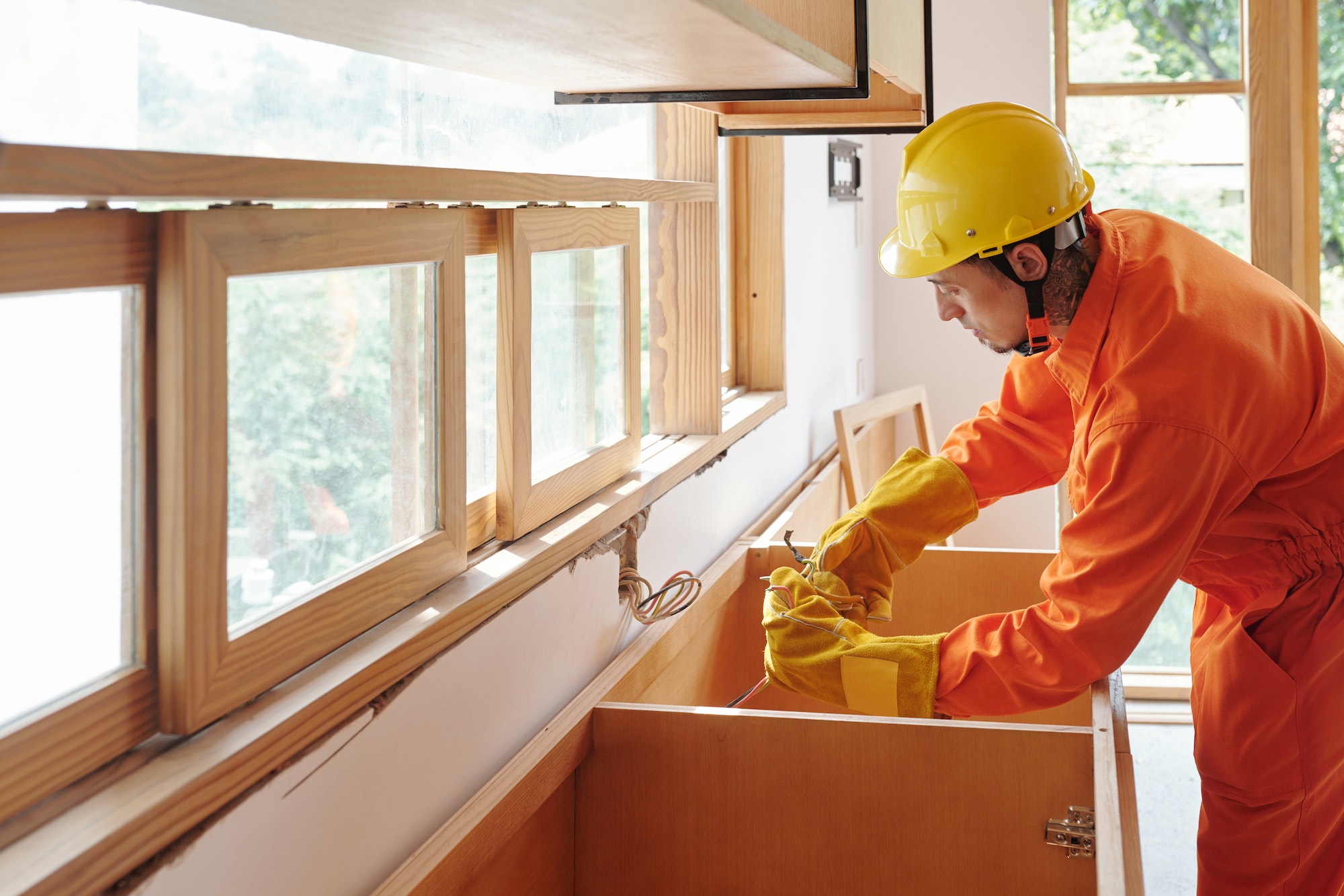 Electrician Checking Kitchen Wiring